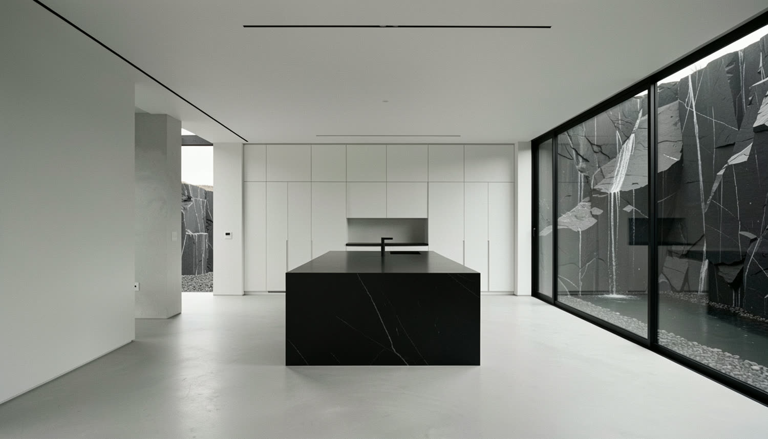 Kitchen with black stone island
